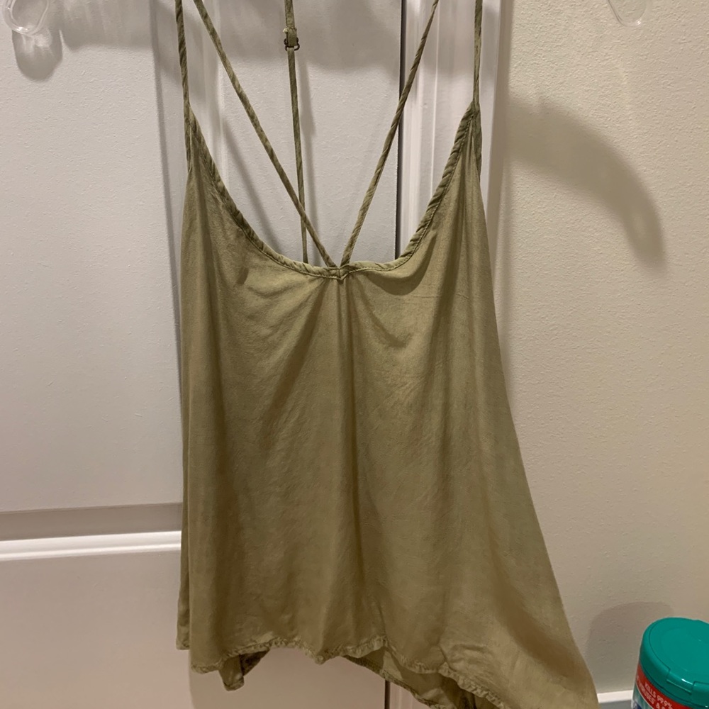 Dressy tank! Criss cross straps in the back.